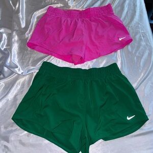Pink Nike shorts - L - $25 Green Nike shorts - L - $25 or $40 for both. NEW.